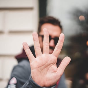 celebrate national high five day - photo by Zan via unsplash